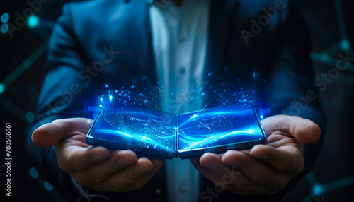 Businessman holding a foldable smartphone, technology concept