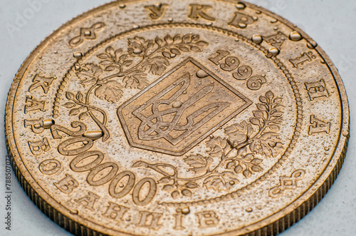 Ukrainian currency, hryvnia, karbovanets, denomination 200,000 with a trident. Macro photo with water drops photo