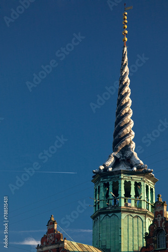 The Copenhagen Stock Exchange spire with the tails of four dragons twined together