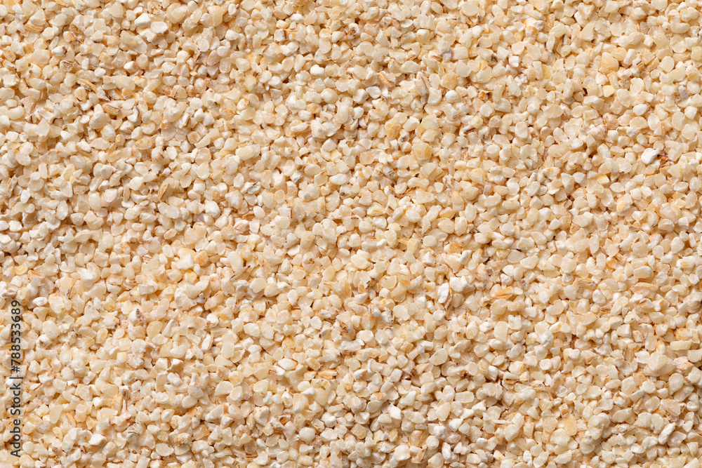 Belboula, dried barley grits full frame close up as background Belboula, dried barley grits full frame close up as background