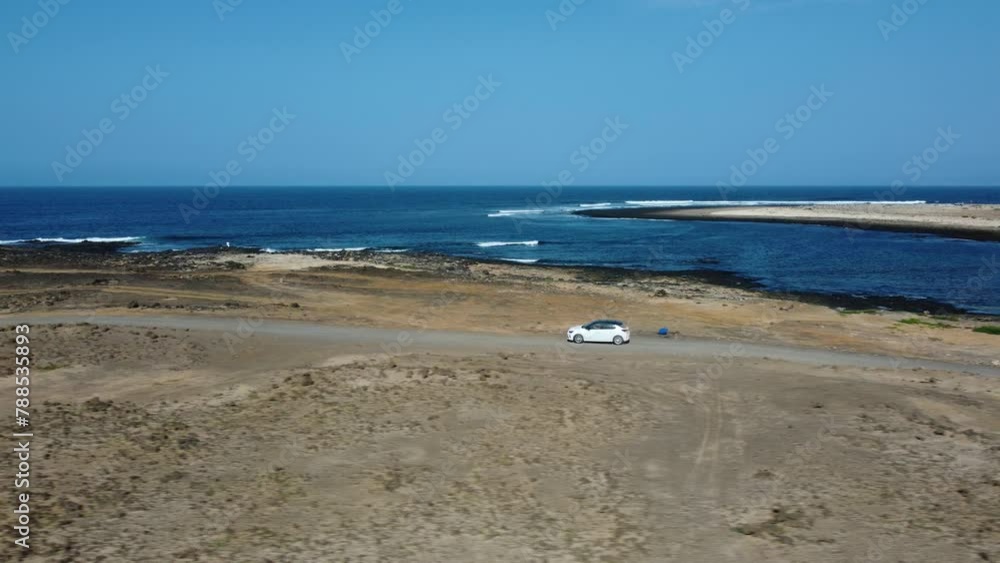 Foto aérea del faro de Sardina, Gran Canaria, Islas Canarias. Dron.WINDING MOUNTAIN ROAD WITH LAKE FROM AERIAL VIEW WITH DRONE Foto aérea del faro de Sardina, Gran Canaria, Islas Canarias. Dron.WINDING MOUNTAIN ROAD WITH LAKE FROM AERIAL VIEW WITH DRONE