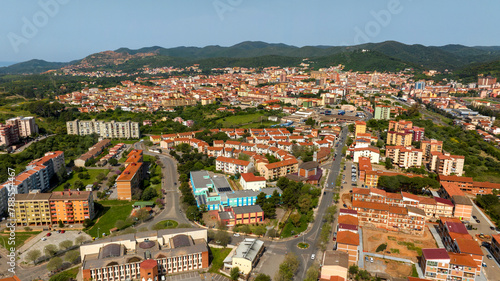 Aerial view of Iglesias, an Italian municipality. It is located in southwestern Sardinia, Italy, in the Iglesiente region. It was one of the royal cities of the island and stands among the hills.