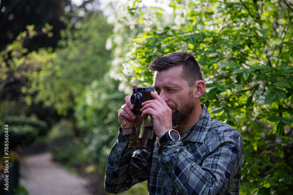 handsome man tourist with camera in Paris handsome man tourist with camera in Paris