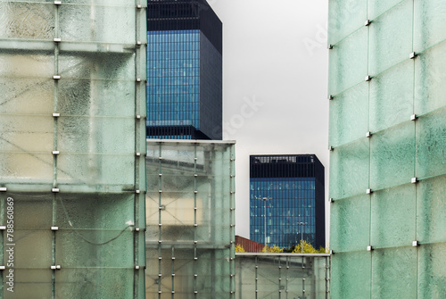 Geometric city buildings, view of the center of Katowice. Glass texture. photo