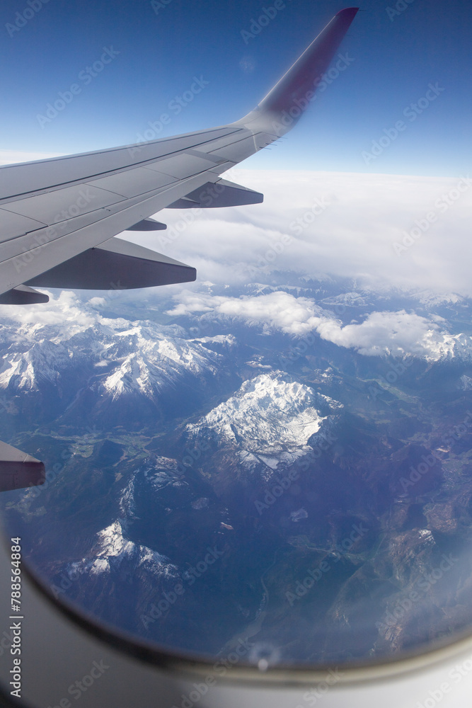 Obraz premium aerial view of snow covered mountain peaks in the Alps