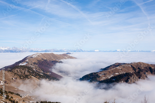 Mountain peaks emerging from the clouds