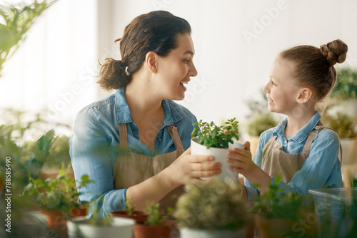 Family caring for plants