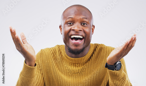 Studio, portrait and black man with I dont know or shrug with face shock, surprised and mind blown. Mockup, male person and hands gesture for gossip news, clueless reaction and white background photo