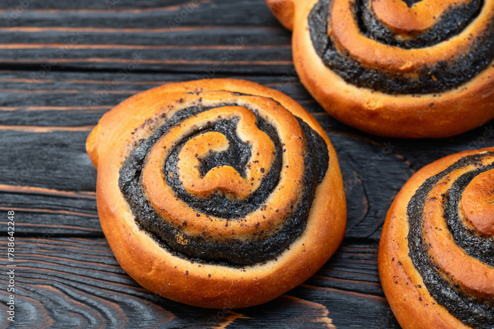 Obraz premium Homemade bun with poppy seeds
