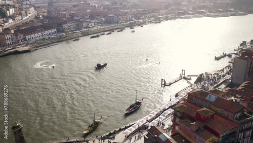Porto, Portugal amazing view of the Cais da Ribeira and Douro river full of boats and skyjets