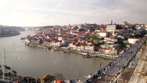 Porto, Portugal insane view of the Douro river, the old town, Bridge Ponte Dom Luis, and the Cais da Ribeira