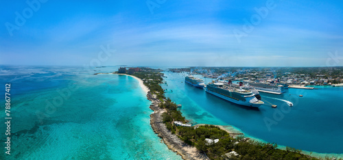 Nassau, The Bahamas - 16 April 2024: Aerial view of Nassau Harbour with Paradise Island and cruise ship, New Providence, The Bahamas. photo