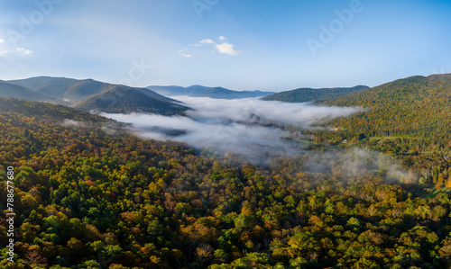 Aerial view of foggy mountains in New England, Sandgate, Vermont, United States.