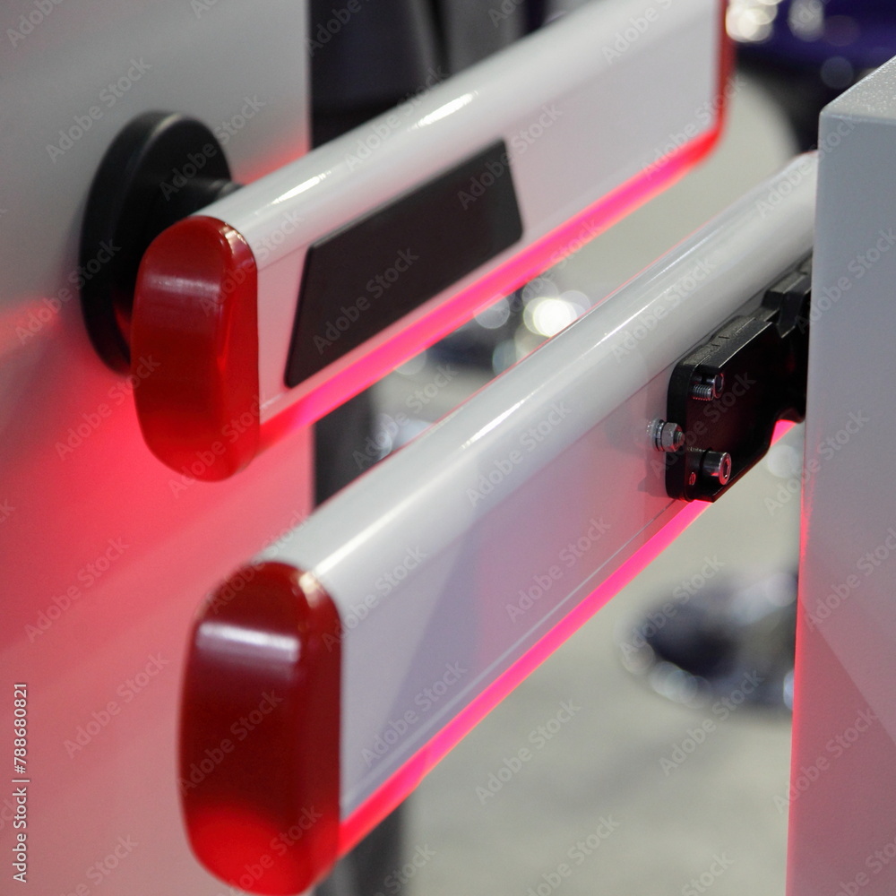 Automatic modern gate barrier with red lighting