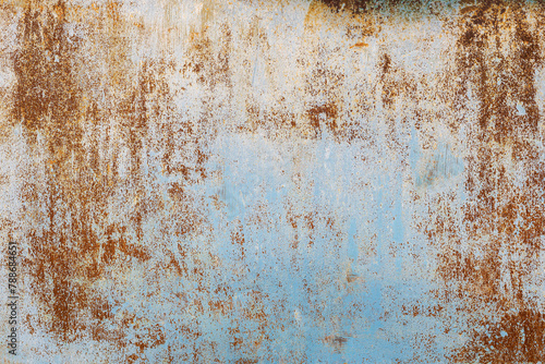 faded and rusted painted metal surface