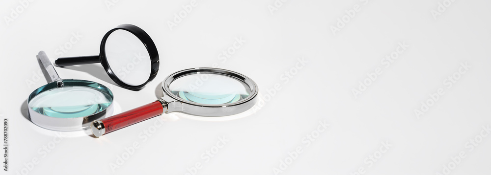 Glass magnify tool for business research. SEO concept with marketing and advertising focus. Glass magnify tool for business research. SEO concept with marketing and advertising focus.