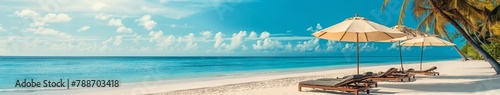 Sunlit Beach Umbrella and Wooden Lounge Chairs
