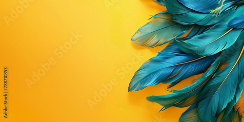 green feathers on the yellow nbackground photo