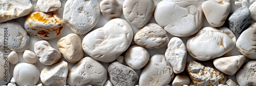White pebbles background. White pebbles texture. White pebbles background. © Anahit