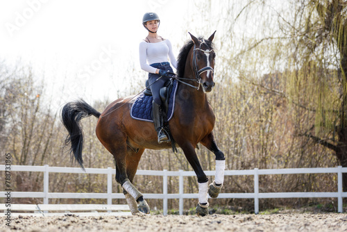 Equestrian Sport Image. Young Equestrian Girl Practices Dressage Vaults