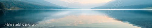 Misty Morning Light on Serene Lake Panorama