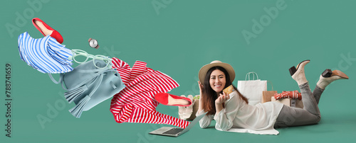 Happy young woman with lapt...