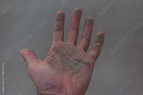hand in the sand