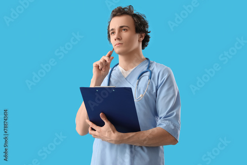 Thoughtful young doctor wit...