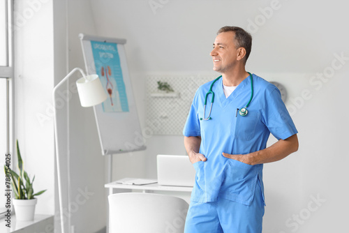 Mature doctor smiling in medical office