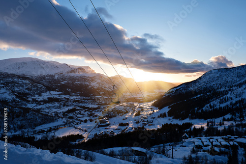 Sunrise over the Norwegian Alps in Hemsedal with ski chairlift 
