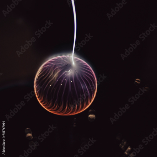 Plasma energy ball with electricity ray isolated on a black background