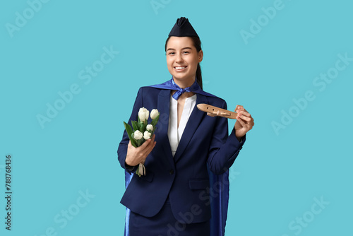 Young stewardess with super...