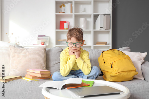 Cute little boy in eyeglass...