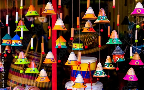 Handcraft ceramic bells showing patterns with Christmas trees