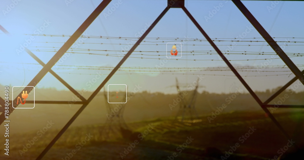 Naklejka premium Digital interfaces float in front of farm landscape at sunrise