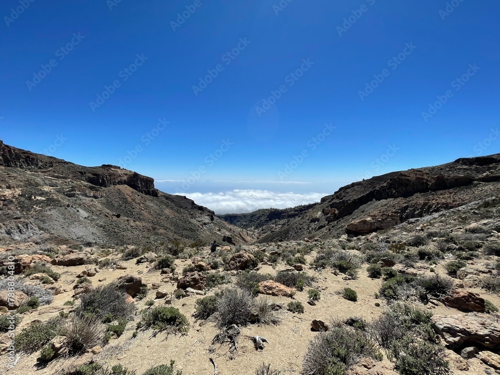 Fototapeta premium Vast desert valley with Tenerife and cloudy sky