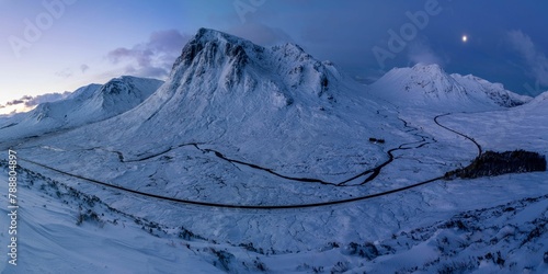 Valokuva Sunrise over snow-covered Glencoe in Winter