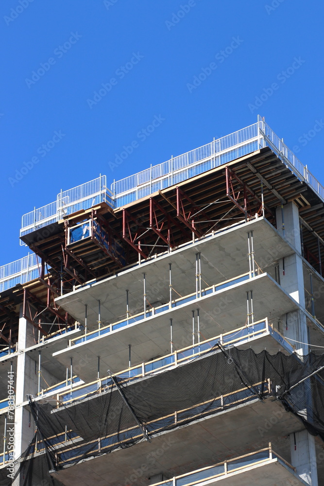 Exterior of a concrete building under construction in a city