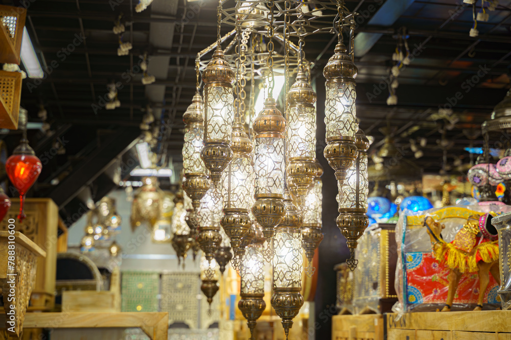 A view from below of a variety of many colorful vintage Arabic and Persian lamps and chandeliers, Fanoos, Manama, Bahrain