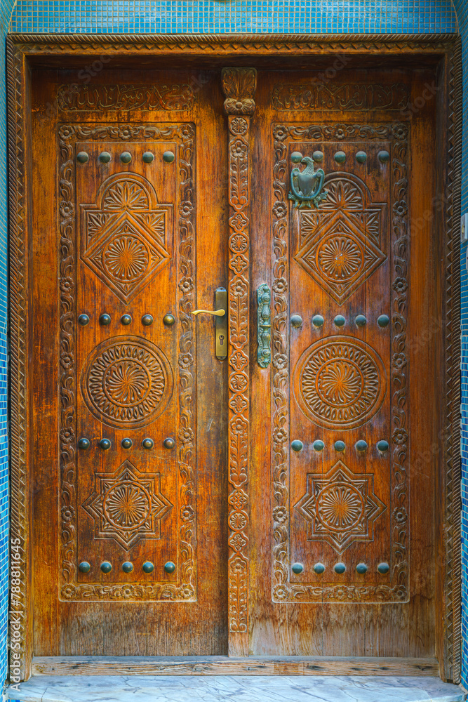 Close up view of an old vintage wooden door on one of the streets of Manama, Bahrain