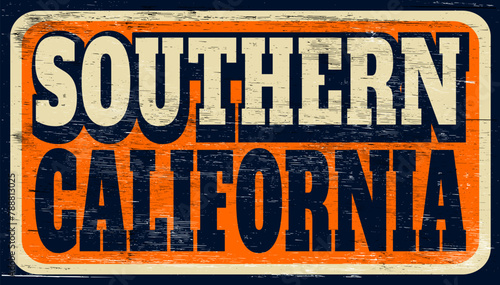 Aged and worn Southern California sign on wood
