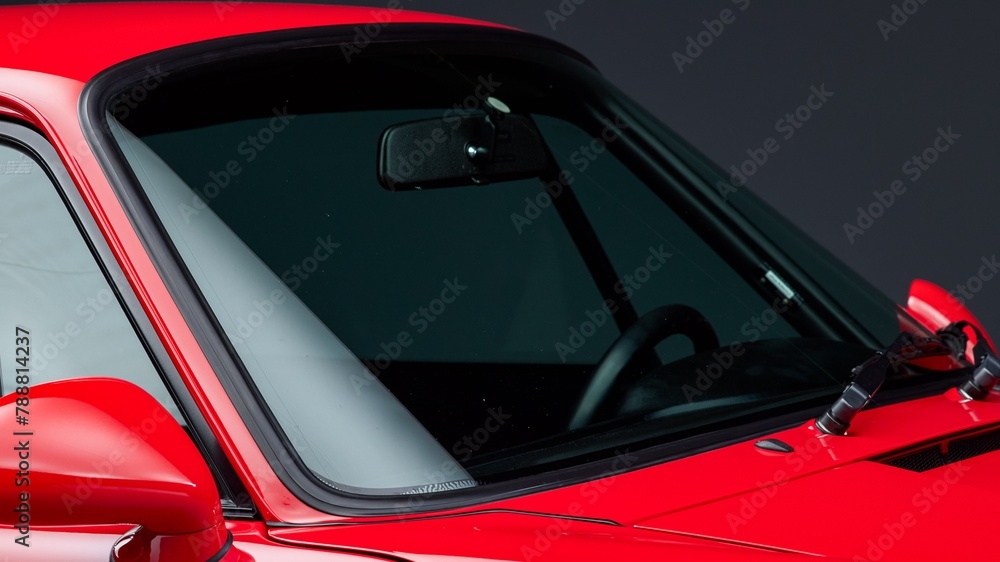 Red car windshield