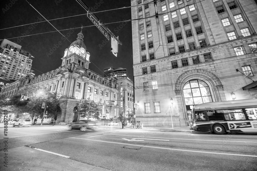 City streets and buildings at night, Vancouver