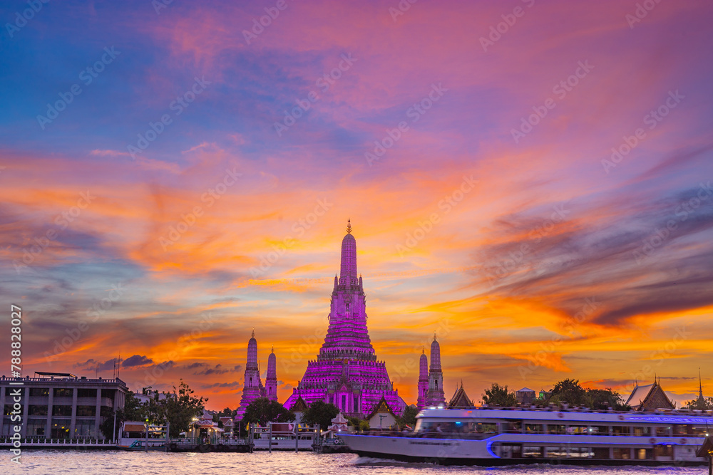 Wat Arun Ratchawararam Ratchawaramahawihan at sunset in bangkok Thailand. Landmark of Along the Chao Phraya River Thailand