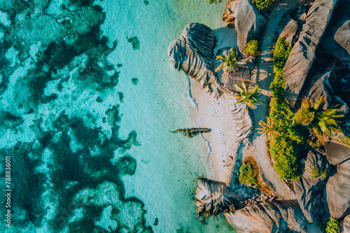 Aerial photo of famous paradiselike tropical beach Anse Source D Argent at La Digue island, Seychelles. Summer vacation, travel and lifestyle concept photo