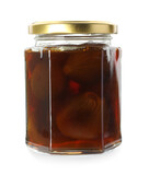 Jar of tasty sweet fig jam isolated on white