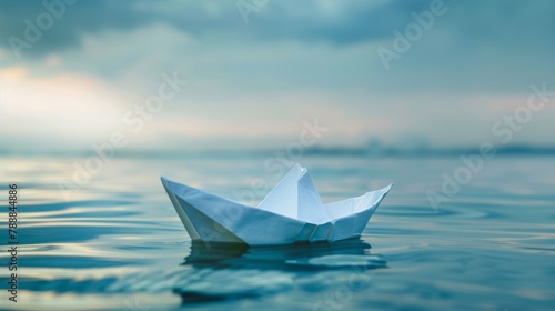 Closeup of a paper boat floating on calm water symbolizing the journey towards healing and transformation in trauma counseling as a means of building a peaceful and resilient mind. .