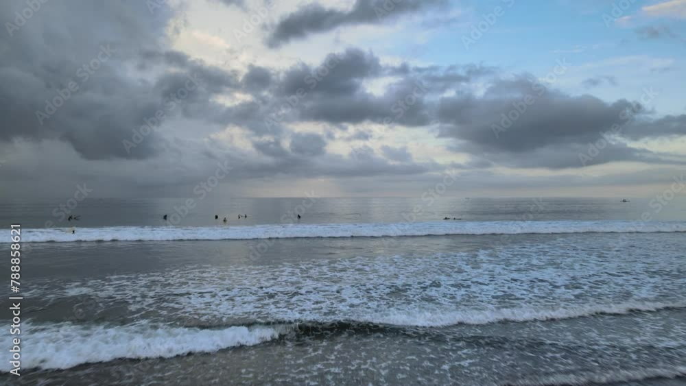 Dive into the thrilling world of surfing at Kuta Beach, Bali, as we explore the art of learning, playing, and practicing this exhilarating sport amidst the breathtaking beauty of Indonesia's coastline