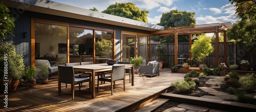 Panoramic view of terrace with wooden furniture and garden furniture © WaniArt
