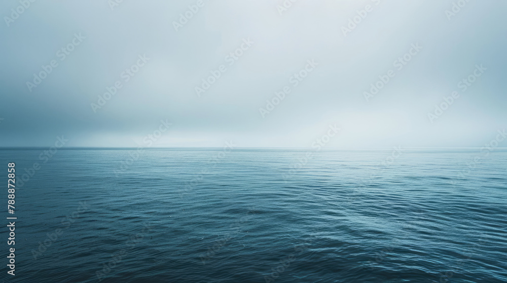 Peaceful ocean expanse under overcast skies in soothing shades - obrazy, fototapety, plakaty 